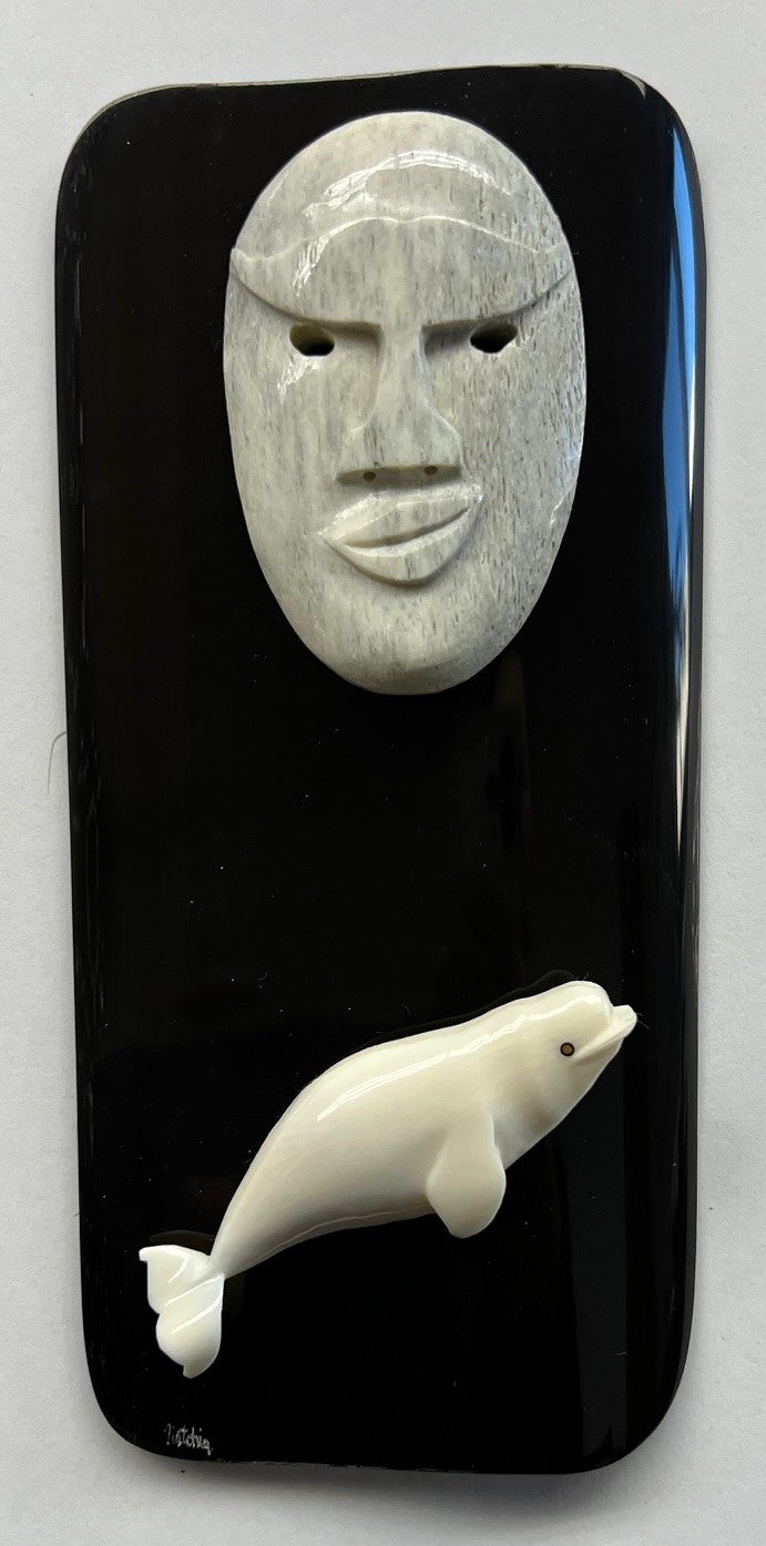 Face and Beluga carving