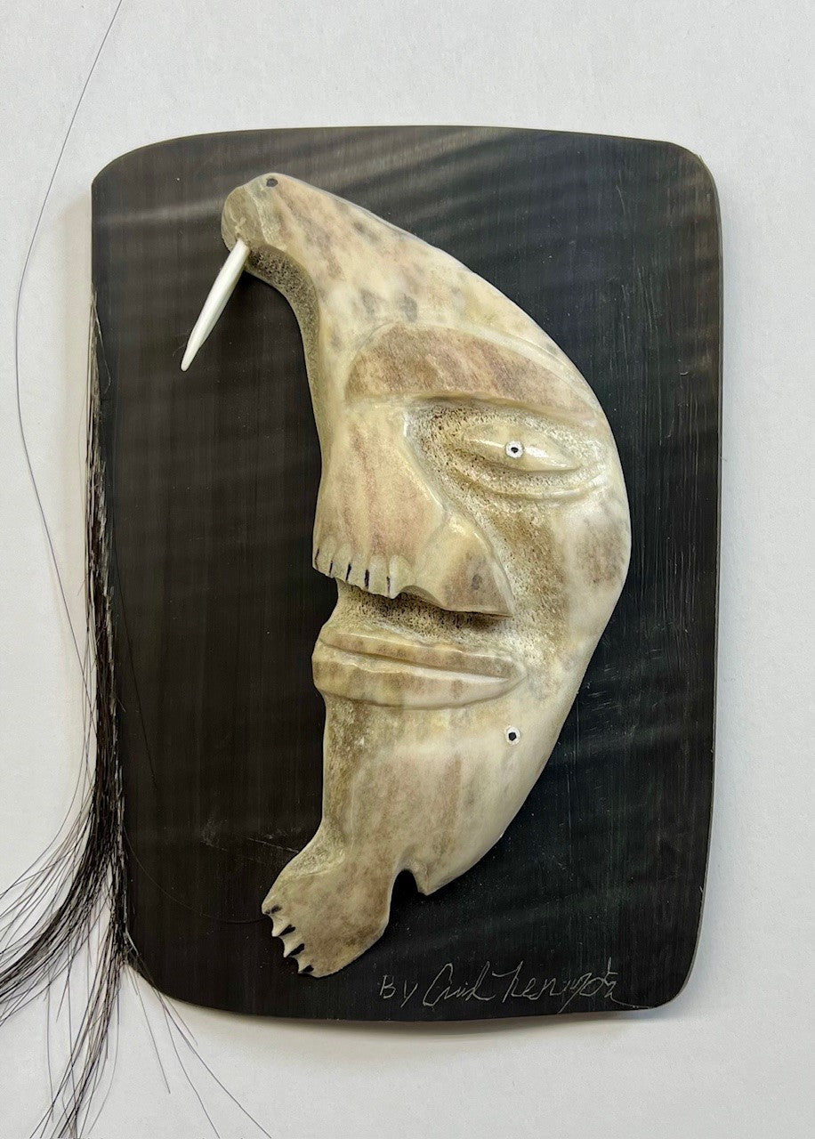 Walrus/Face Carving