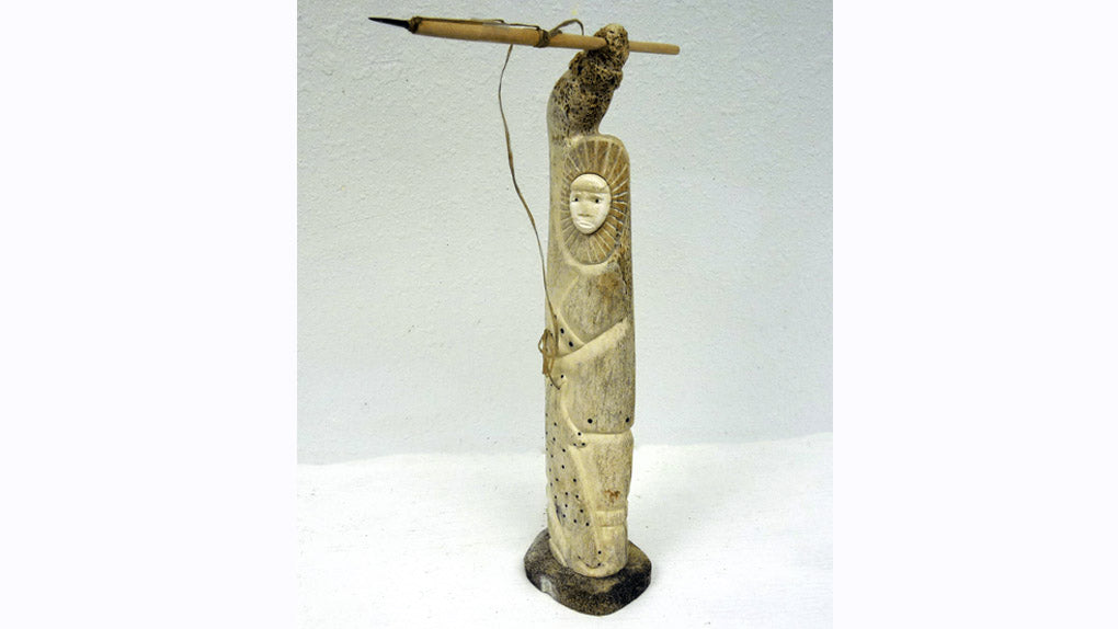 whalebone carved alaskan native hunter with harpoon